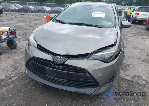 2017 Toyota Corolla Le z USA, uszkodzony, nr VIN 5YFBURHE5HP665334